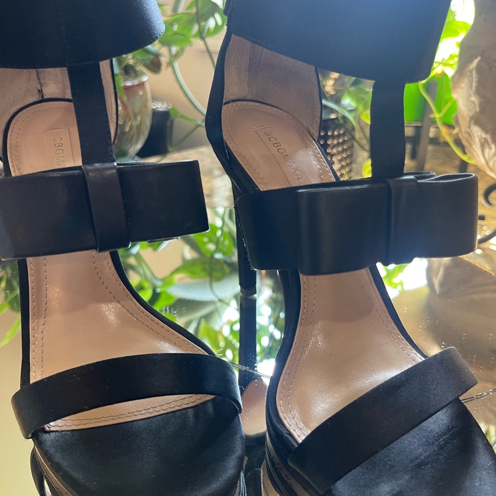 BCBGMaxAzria Black Heels with Leather Bow and Strap Design. EUC